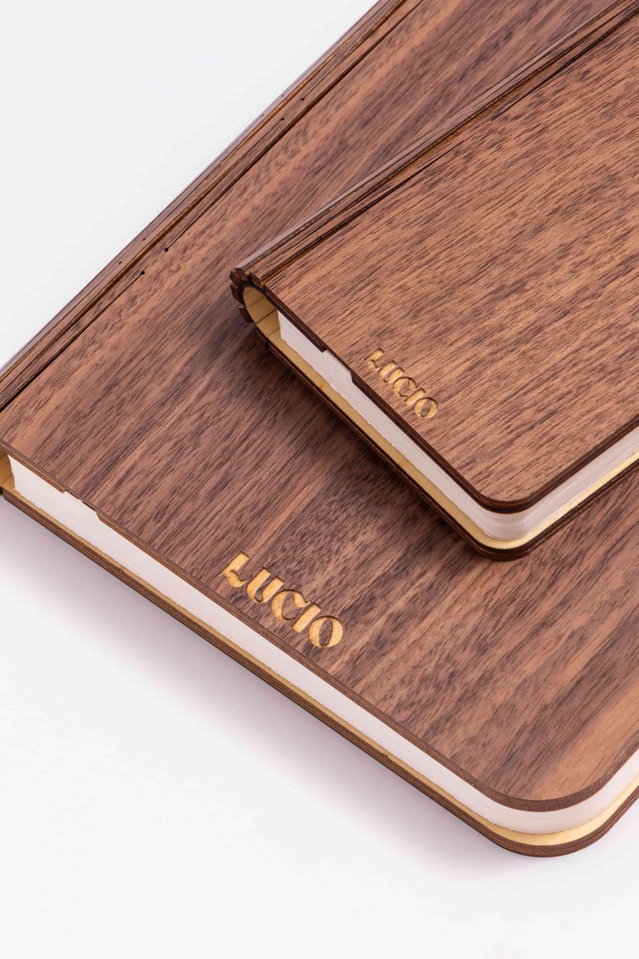 Wooden phone case with 'LUCIO' branding on a white background