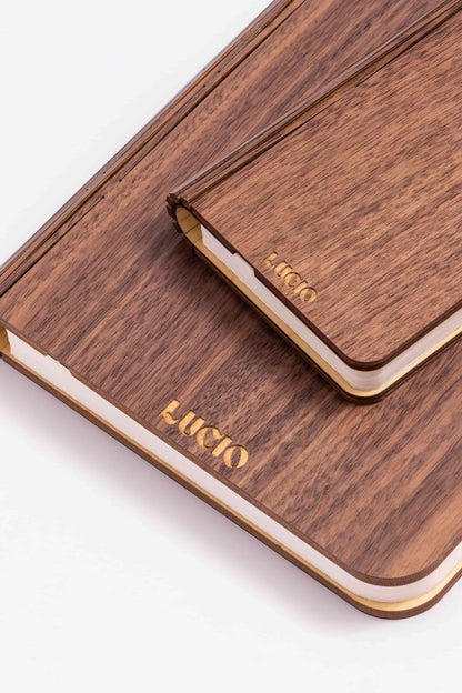 Wooden phone case with 'LUCIO' branding on a white background